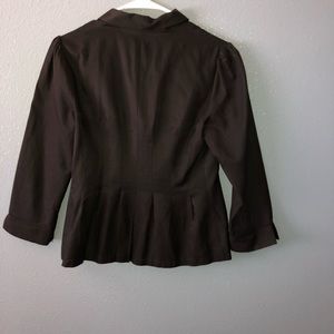 Black blazer with light pink underlining